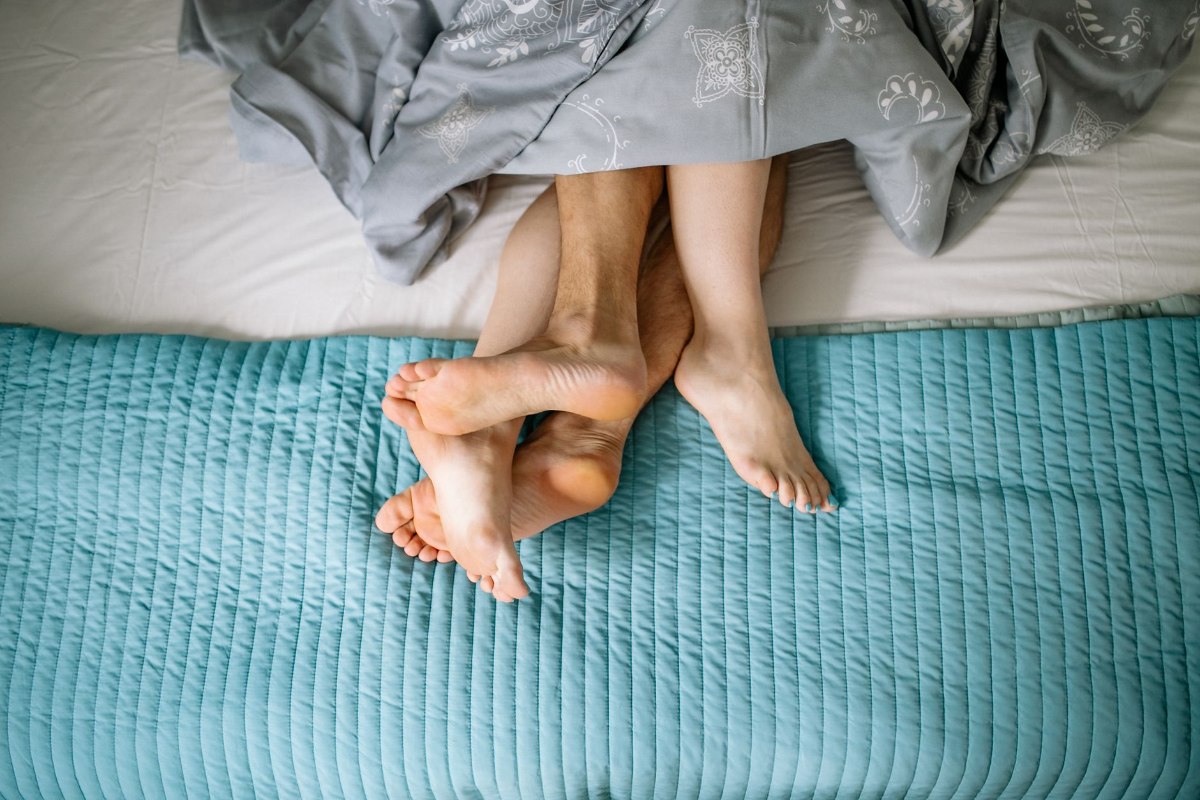 Couple sharing closeness in soft morning light
