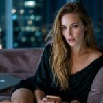 Covert Bullying at Work; Why Does It Hurt More Than Yelling? زن جوان خسته از کار در آپارتمان شبانه با روب ابریشمی — قلدری پنهان در محل کار