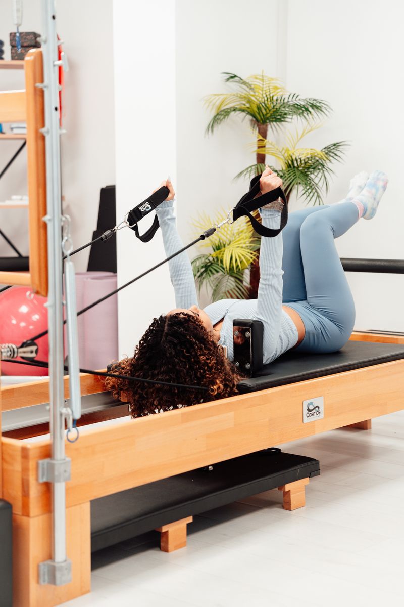 Woman on pilates reformer